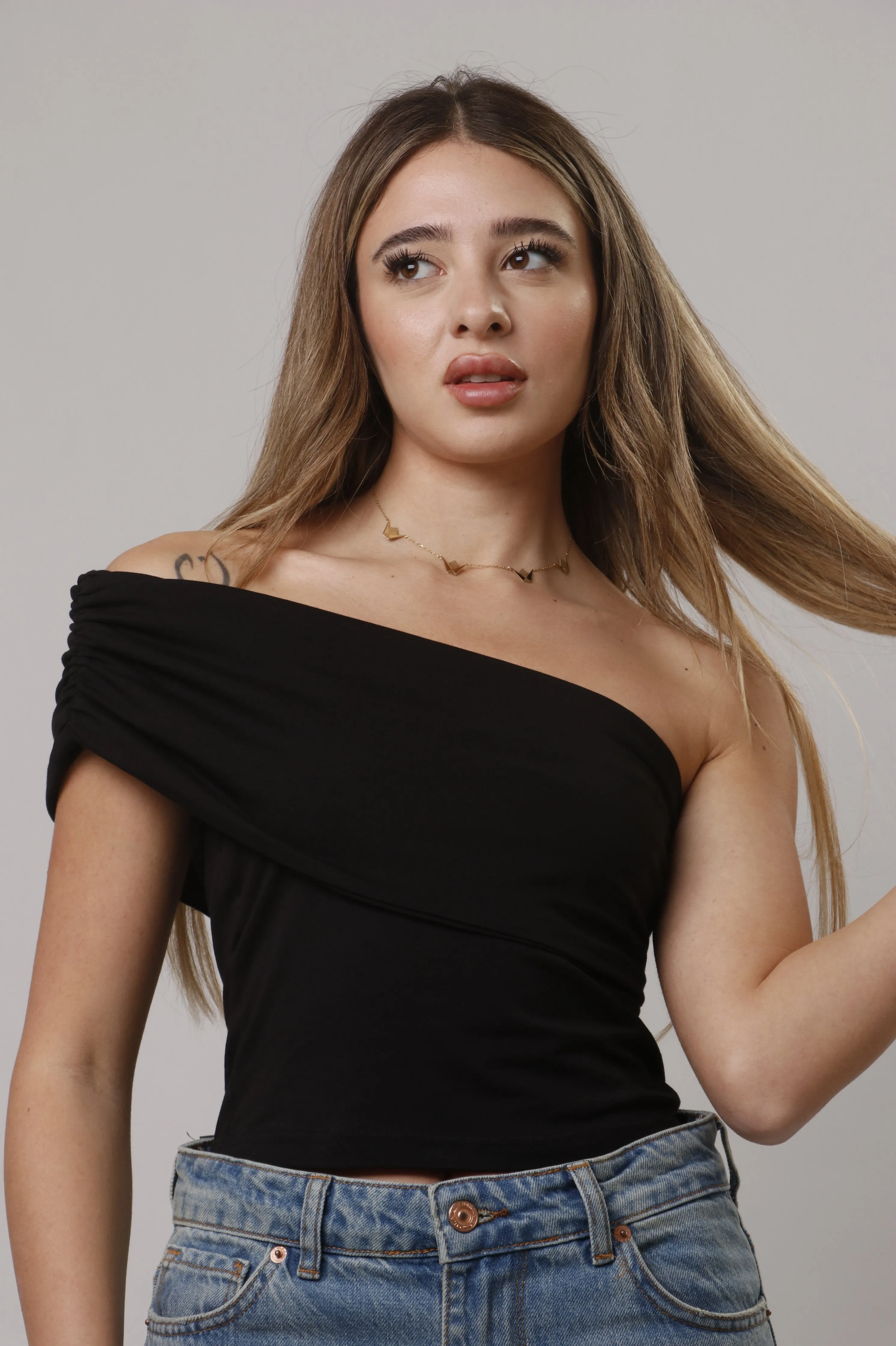 Asymmetric off shoulder top