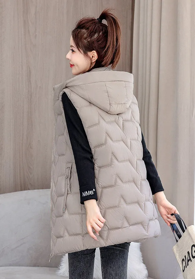 Stay Warm with Our Relaxed-Fit Hooded Quilted Puffer Vest